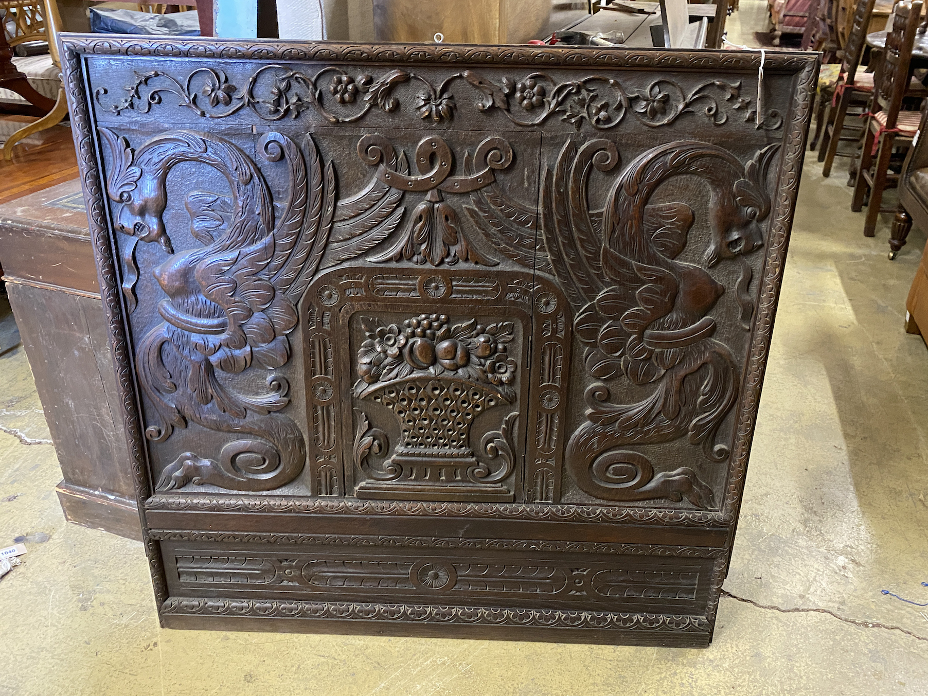 A French carved oak panel, width 104cm, height 103cm